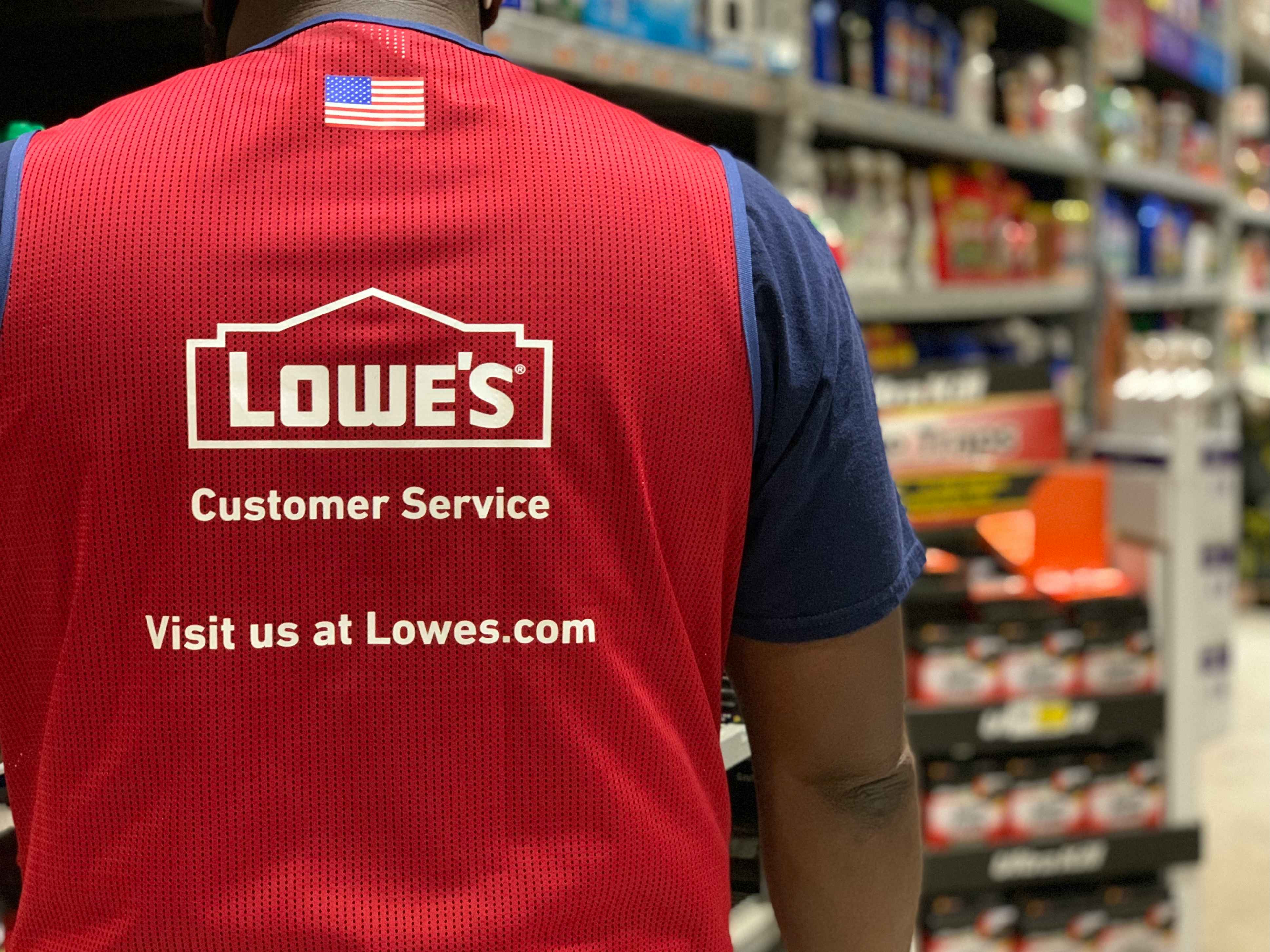 Lowes employee back in Lowes vest in store